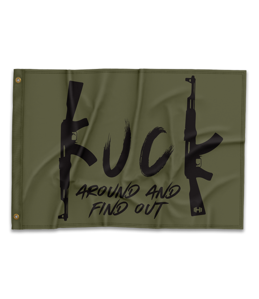 Picture of a green flag with black writing that says FAFO