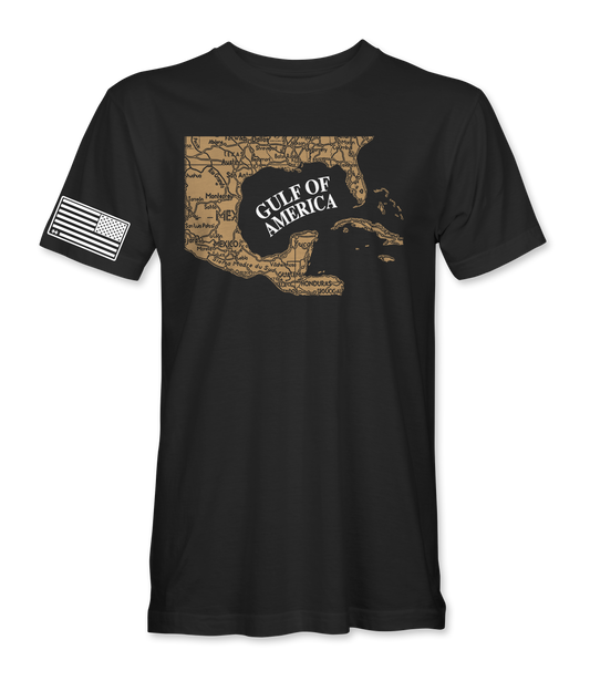 Black shirt with a golden map of the gulf of mexico. white lettering saying "Gulf Of America" inside where the Gulf of Mexico is. 